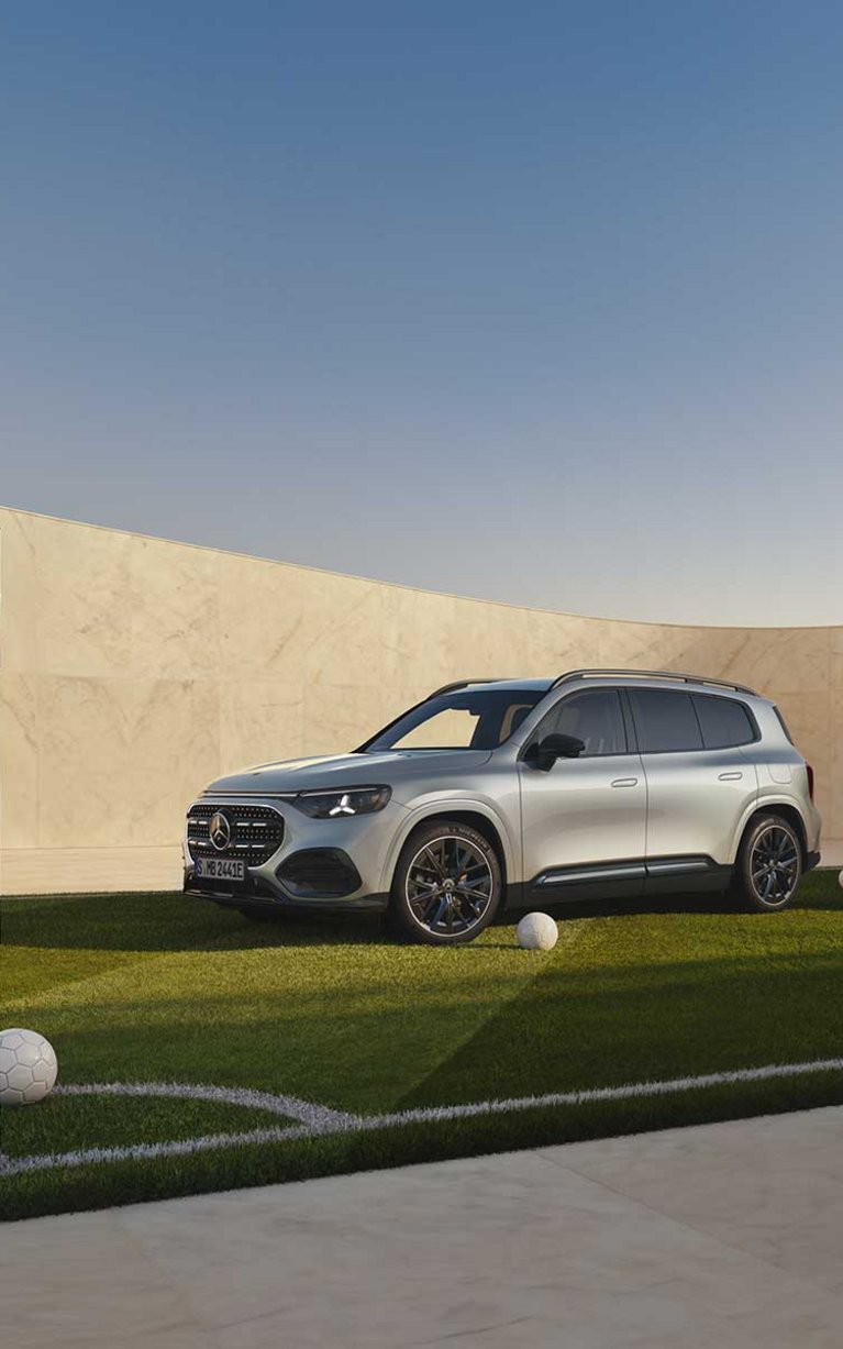 Mercedes-Benz Fahrzeug vor moderner Architektur als Motiv zur Eintauschprämie bei S&G Mercedes-Benz.