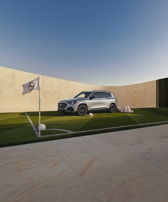 Mercedes-Benz Fahrzeug vor moderner Architektur als Motiv zur Eintauschprämie bei S&G Mercedes-Benz.