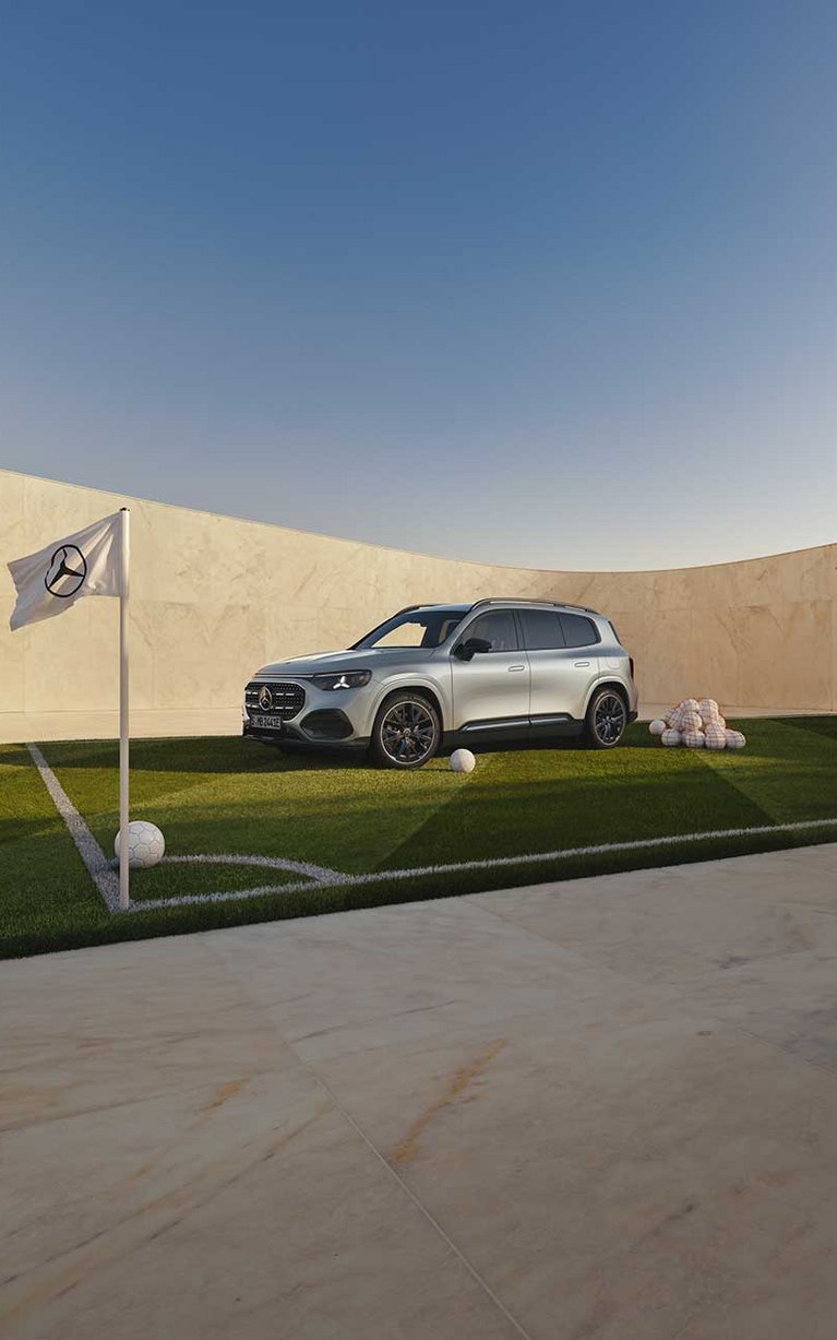 Mercedes-Benz Fahrzeug vor moderner Architektur als Motiv zur Eintauschprämie bei S&G Mercedes-Benz.