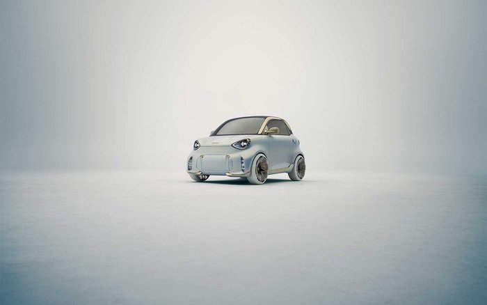 Frontansicht des smart Concept #2 in silber auf weißem Hintergrund. Das kompakte Elektro-Konzeptfahrzeug zeigt modernes Design als Ausblick auf den kommenden smart #2.